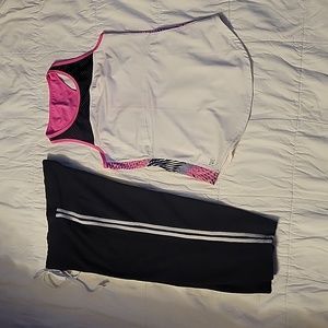 Women's workout set.  Blk Capri pants size Petite/Small top is size small.
